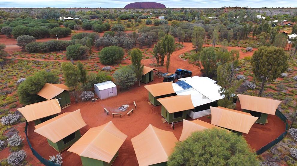 I Red Centre bor en på private campingplasser. Her med Uluru i bakgrunnen. Foto: Wayoutback