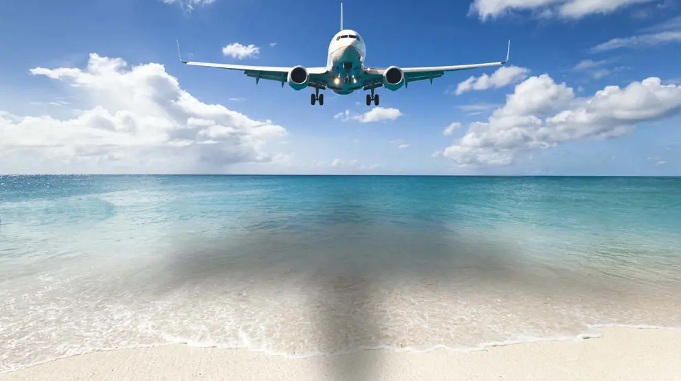 På St. Maarten får du en unik opplevelse, når du ser fly rett over hodet på deg