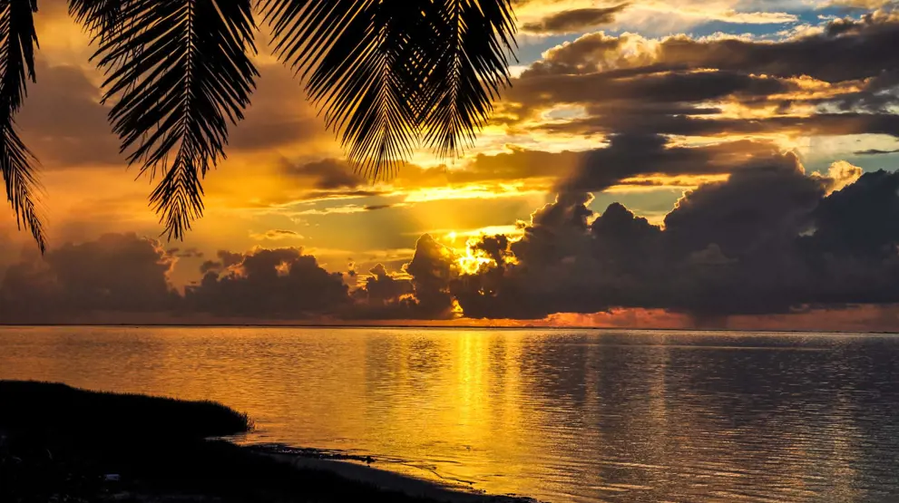 Vakker solnedgang på Aitutaki - Reiser til Cook Islands